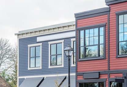 Top view of modern retail buildings with condos on top in Langley, BC